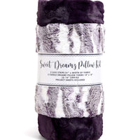 Sweet Dreamz Pillow Kit containing Luxe Cuddle® fabric strips, zippers, and project sheets for pillow-making.